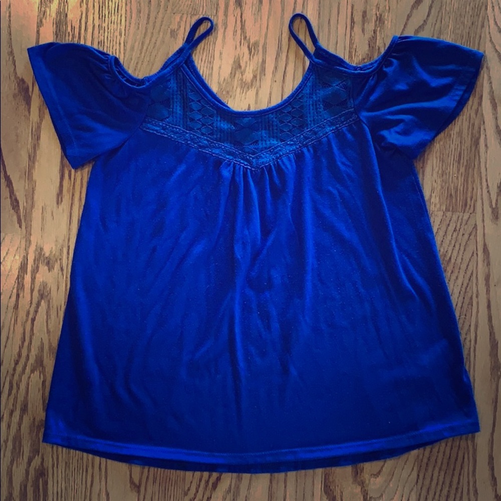 Girls bluish/purple top. Open shoulder. Size XL.